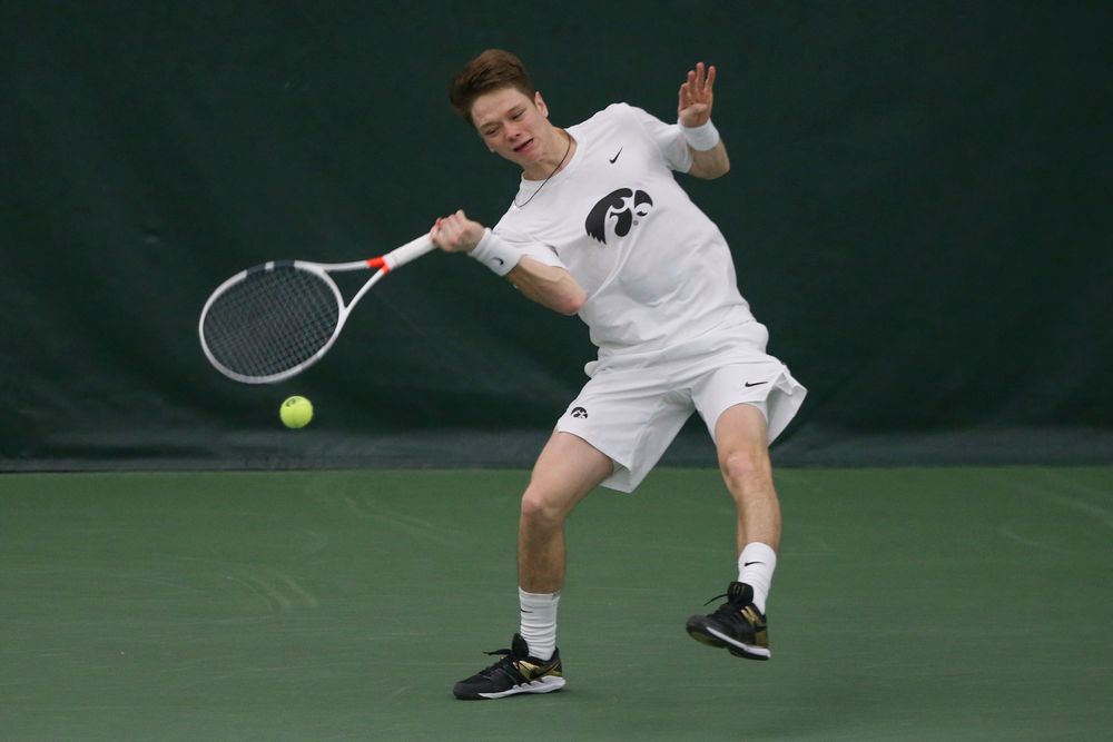 Iowa’s Jason Kerst returns a hit during the Iowa men’s tennis meet vs Nebraska on Sunday, March 1, 2020 at the Hawkeye Tennis and Recreation Complex. (Lily Smith/hawkeyesports.com)
