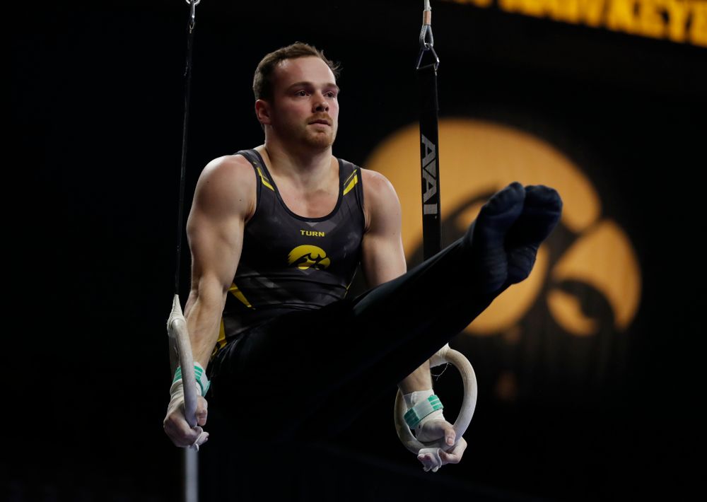 Iowa's Dylan Ellsworth competes on the rings 