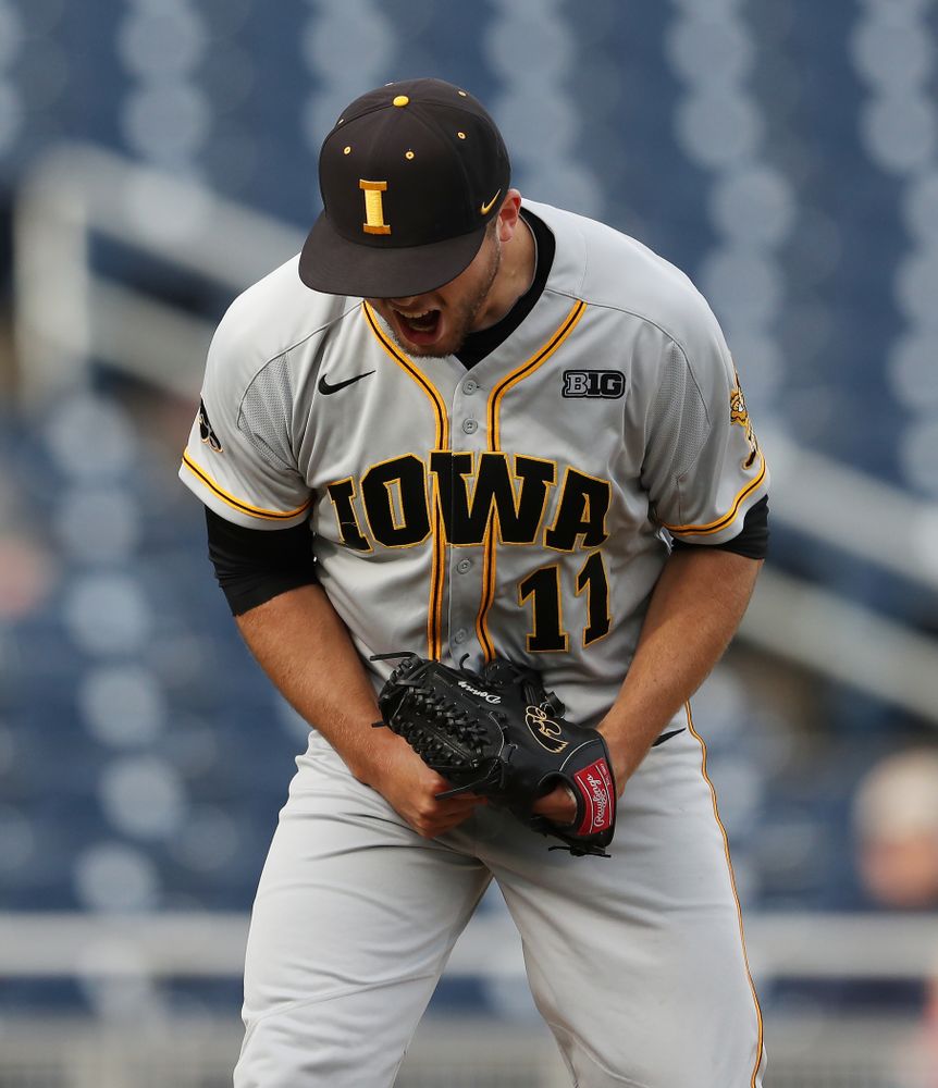 Iowa Hawkeyes Cole McDonald (11) reacts after getting a strikeout to end an inning against the Indiana Hoosiers in the first round of the Big Ten Baseball Tournament Wednesday, May 22, 2019 at TD Ameritrade Park in Omaha, Neb. (Brian Ray/hawkeyesports.com)