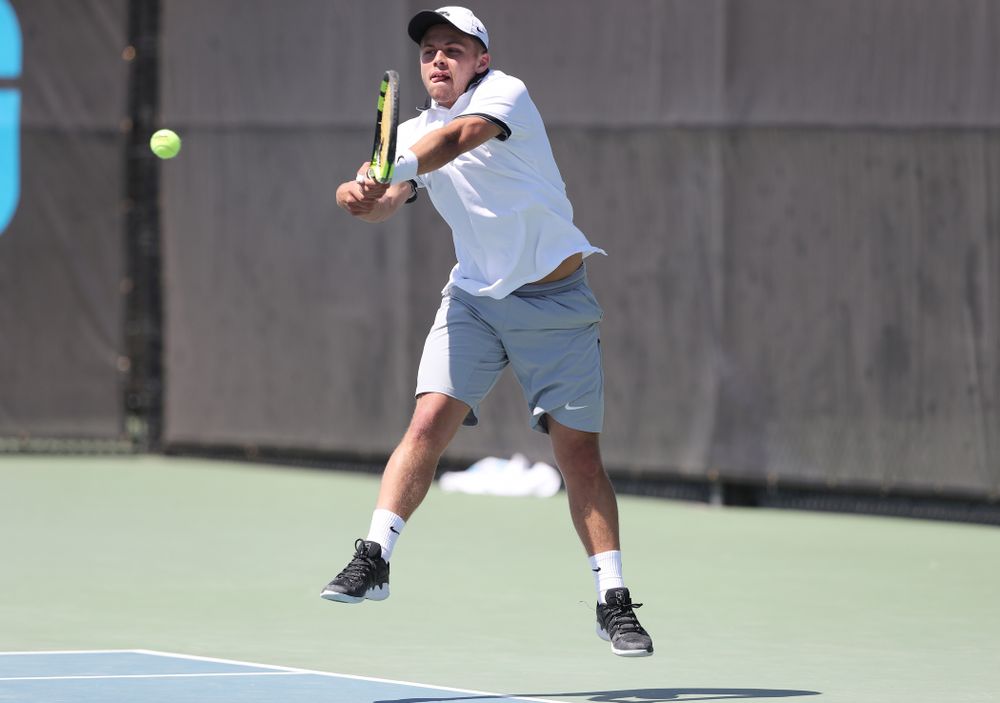 IowaÕs Will Davies against the Michigan Wolverines Sunday, April 21, 2019 at the Hawkeye Tennis and Recreation Complex. (Brian Ray/hawkeyesports.com)