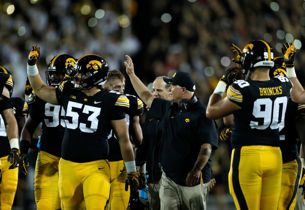 Iowa Hawkeyes defensive line coach Reese Morgan waves tot he Stead Family Children's Hospital against the Wisconsin Badgers Saturday, September 22, 2018 at Kinnick Stadium. (Brian Ray/hawkeyesports.com)