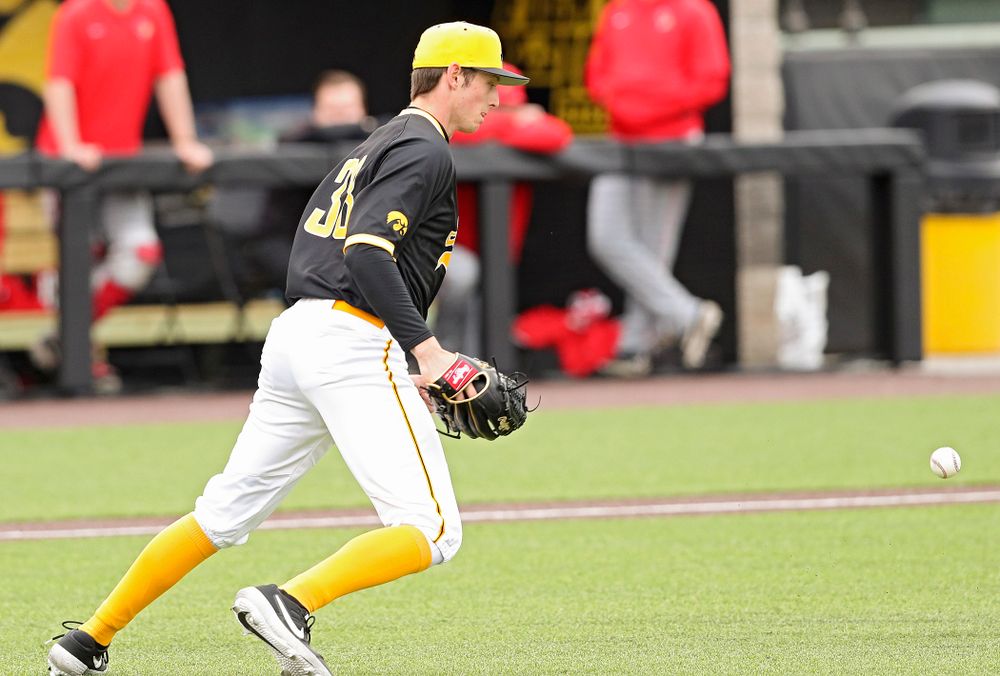 Iowa Hawkeyes pitcher Trenton Wallace (38) lets the ball drop in front of him before starting a double play during the third inning of their game against Illinois State at Duane Banks Field in Iowa City on Wednesday, Apr. 3, 2019. (Stephen Mally/hawkeyesports.com)