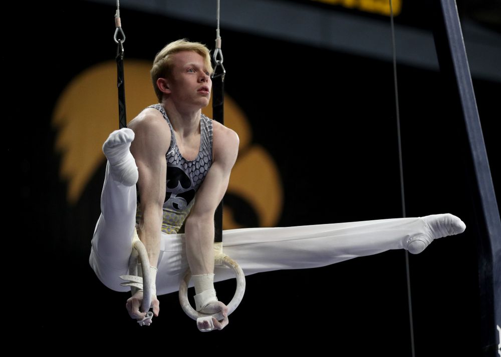 Iowa’s Nick Merryman competes on the rings against Illinois Sunday, March 1, 2020 at Carver-Hawkeye Arena. (Brian Ray/hawkeyesports.com)