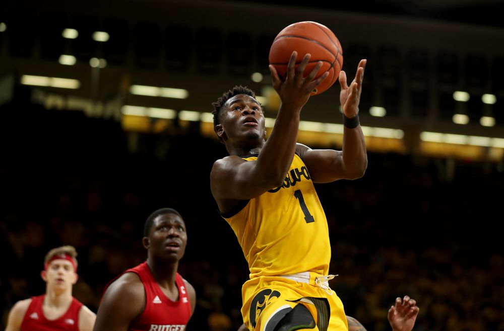 Iowa Hawkeyes guard Joe Toussaint (1) goes to the hoop against the Rutgers Scarlet Knights  Wednesday, January 22, 2020 at Carver-Hawkeye Arena. (Brian Ray/hawkeyesports.com)