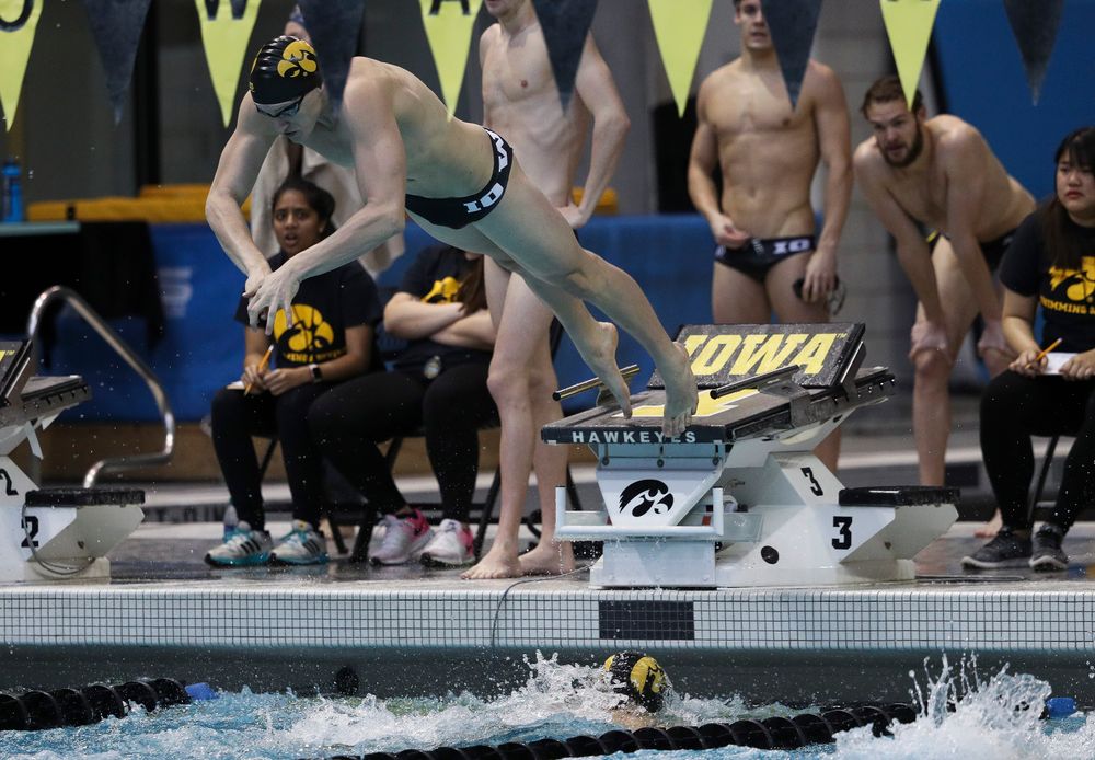 Iowa's Joe Myhre competes in the 400-yard medley relay during a meet against Michigan and Denver at the Campus Recreation and Wellness Center on November 3, 2018. (Tork Mason/hawkeyesports.com)