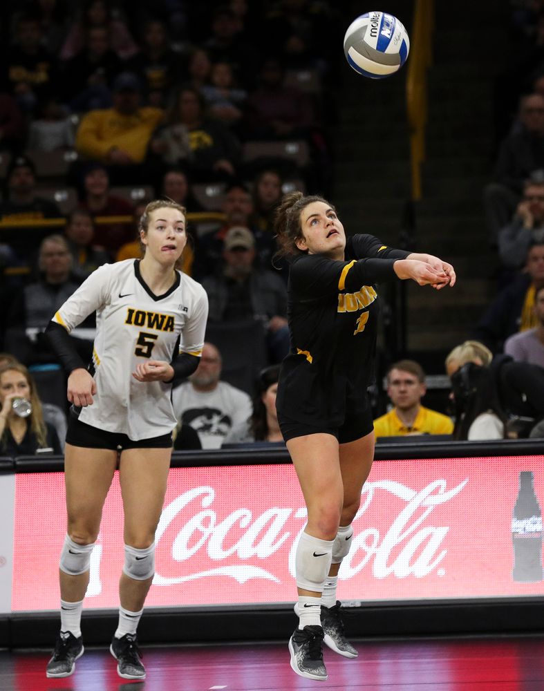 Iowa Hawkeyes defensive specialist Molly Kelly (1) bumps the ball during a match against Maryland at Carver-Hawkeye Arena on November 23, 2018. (Tork Mason/hawkeyesports.com)