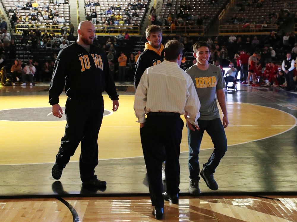 Iowa seniors Sam Stoll, Mitch Bowman, and Perez Perez before their meet against the Indiana Hoosiers Friday, February 15, 2019 at Carver-Hawkeye Arena. (Brian Ray/hawkeyesports.com)