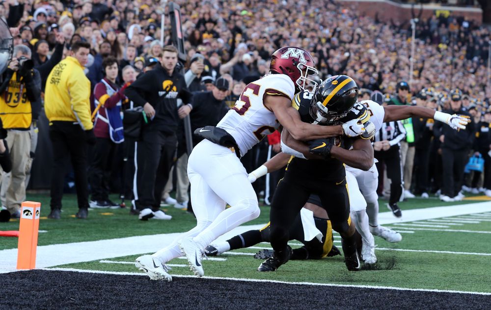 Iowa Hawkeyes running back Tyler Goodson (15) fights his way into the end zone for a touchdown against the Minnesota Golden Gophers Saturday, November 16, 2019 at Kinnick Stadium. (Brian Ray/hawkeyesports.com)