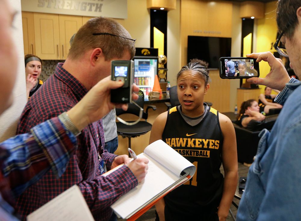 Iowa Hawkeyes guard Tania Davis (11) answers a question during media availability before their next game in the 2019 NCAA Women's Basketball Tournament at Carver Hawkeye Arena in Iowa City on Saturday, Mar. 23, 2019. (Stephen Mally for hawkeyesports.com)