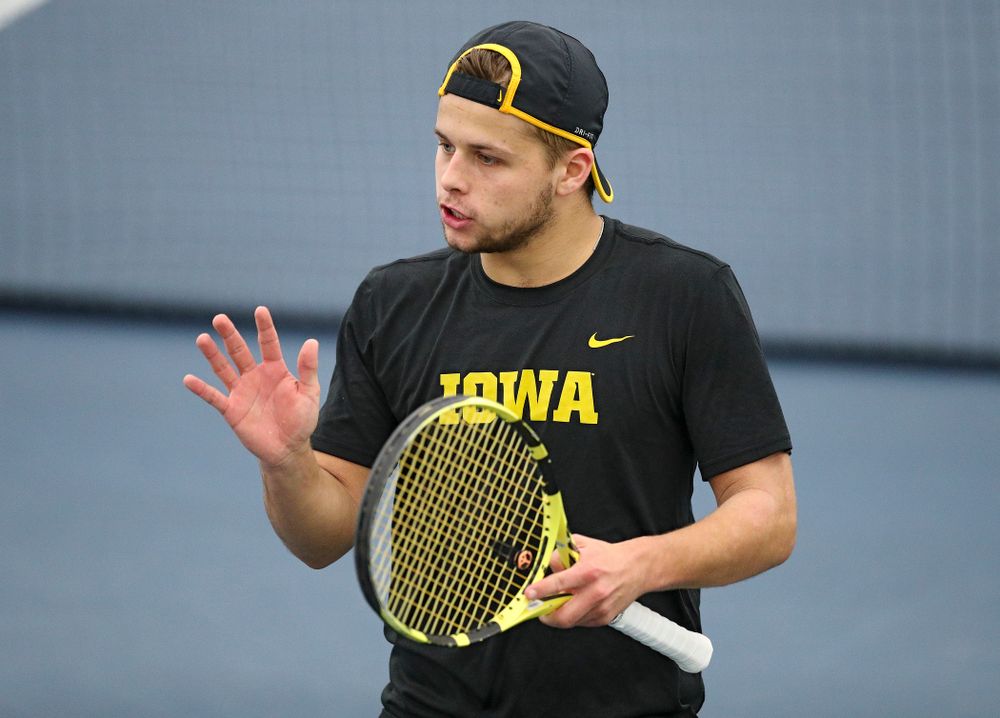 Iowa’s Will Davies celebrates a point during their doubles match against Marquette at the Hawkeye Tennis and Recreation Complex in Iowa City on Saturday, January 25, 2020. (Stephen Mally/hawkeyesports.com)