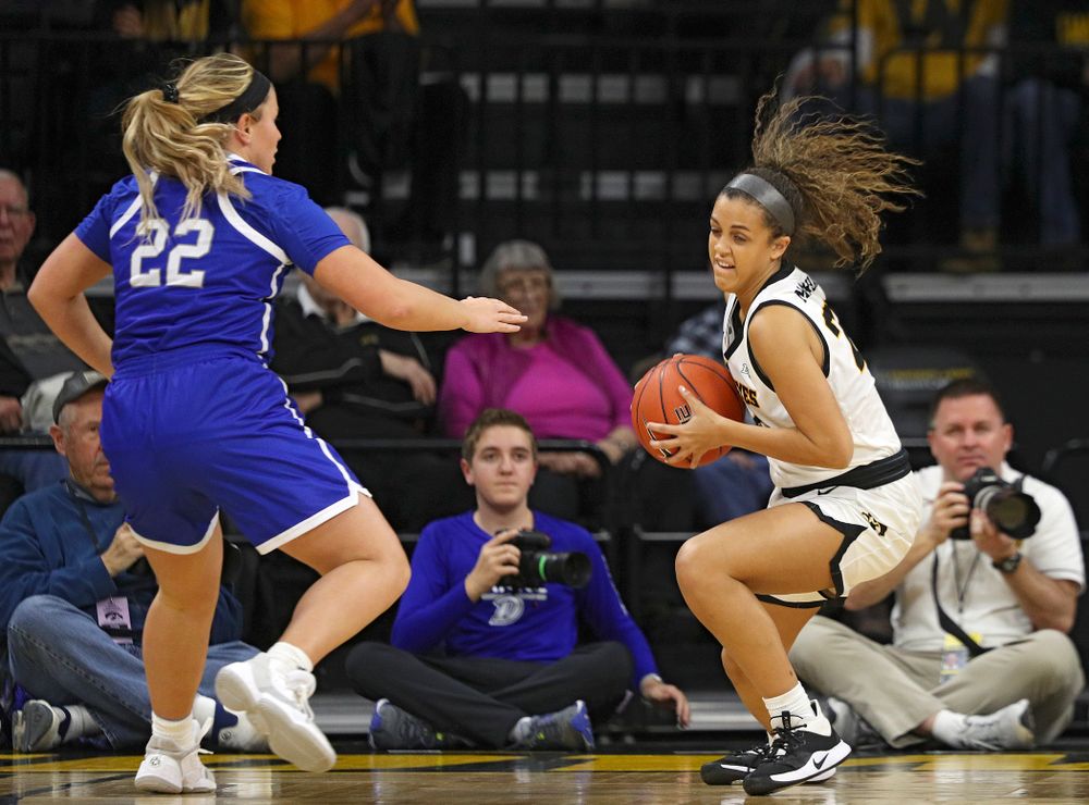 Iowa Hawkeyes guard Gabbie Marshall (24) steals the ball away during the first quarter of their game at Carver-Hawkeye Arena in Iowa City on Saturday, December 21, 2019. (Stephen Mally/hawkeyesports.com)