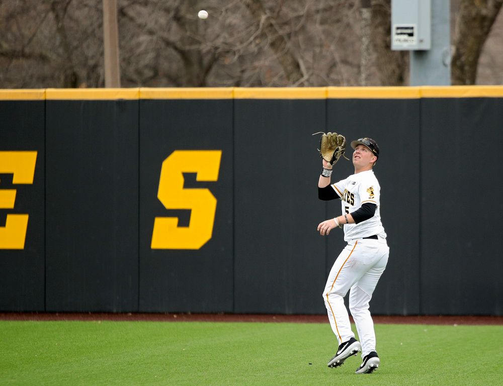 Iowa right fielder Zeb Adreon (5) runs down a fly ball for an out during the third inning of their college baseball game at Duane Banks Field in Iowa City on Wednesday, March 11, 2020. (Stephen Mally/hawkeyesports.com)