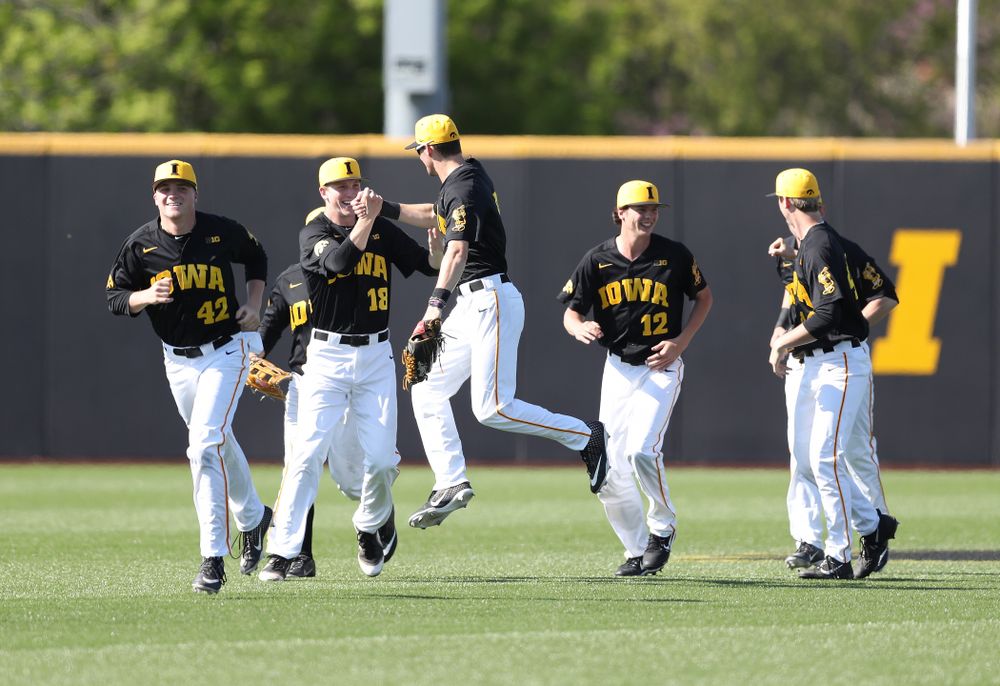 Iowa Hawkeyes Shane Ritter (18) and outfielder Ben Norman (9) celebrate after winning game two against UC Irvine Saturday, May 4, 2019 at Duane Banks Field. (Brian Ray/hawkeyesports.com)