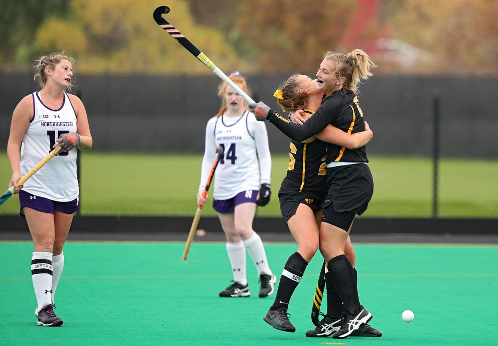 Iowa’s Maddy Murphy (26) celebrates with Leah Zellner (13) after Zellner score a goal during the third quarter of their game at Grant Field in Iowa City on Saturday, Oct 26, 2019. (Stephen Mally/hawkeyesports.com)