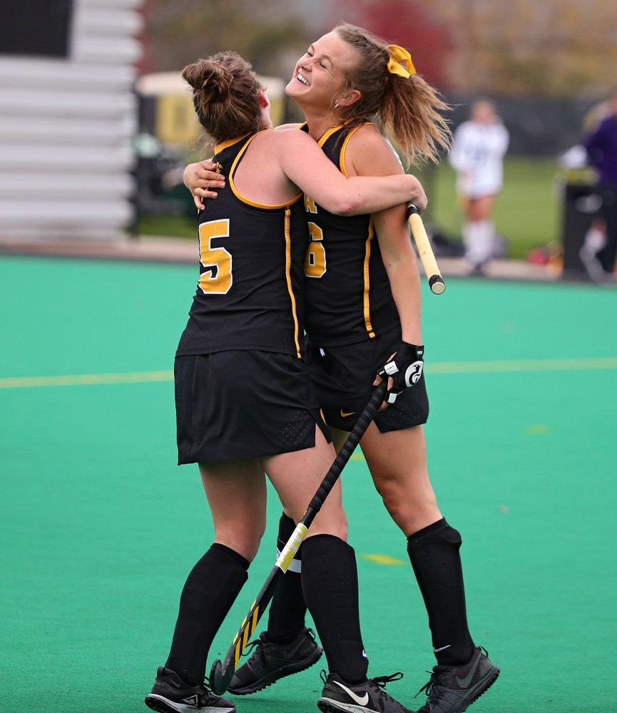 Iowa’s Meghan Conroy (5) celebrates with Maddy Murphy (26) after Murphy scored a goal during the fourth quarter of their game at Grant Field in Iowa City on Saturday, Oct 26, 2019. (Stephen Mally/hawkeyesports.com)
