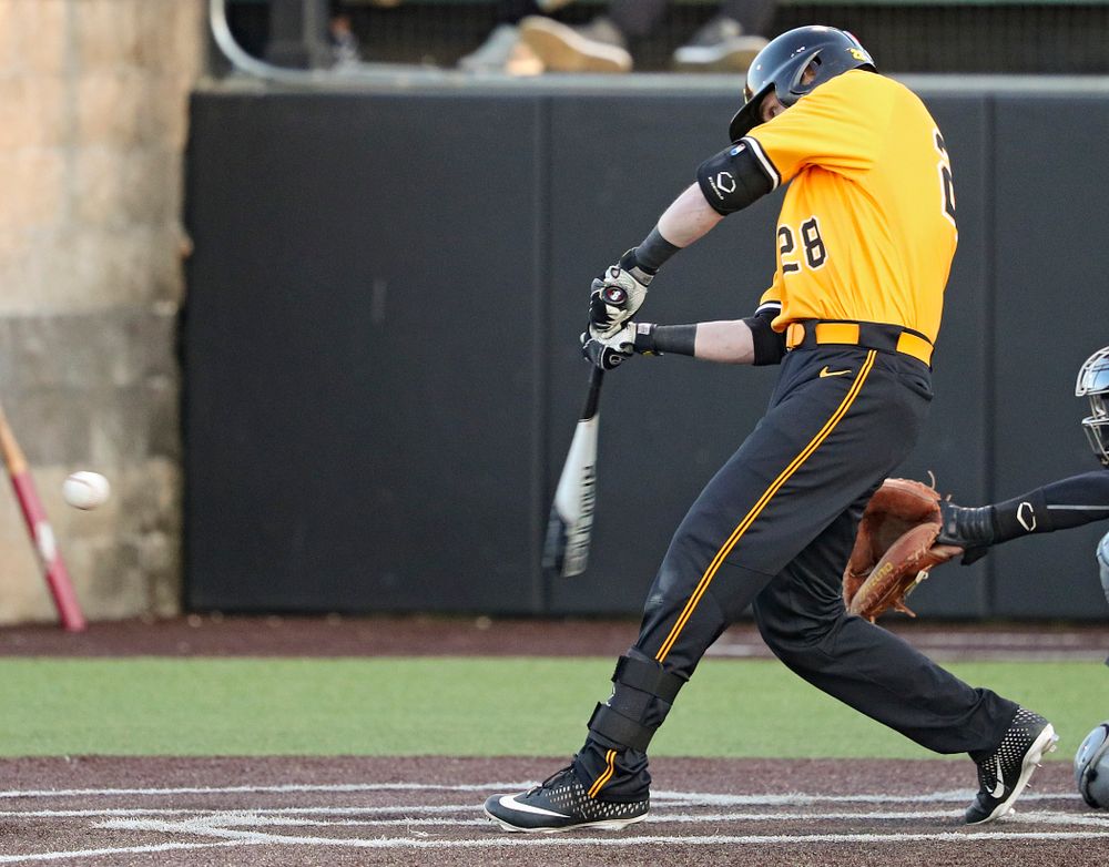 Iowa Hawkeyes left fielder Chris Whelan (28) drives in the winning run with a sacrifice fly during the eighth inning of their game at Duane Banks Field in Iowa City on Tuesday, Apr. 2, 2019. (Stephen Mally/hawkeyesports.com)