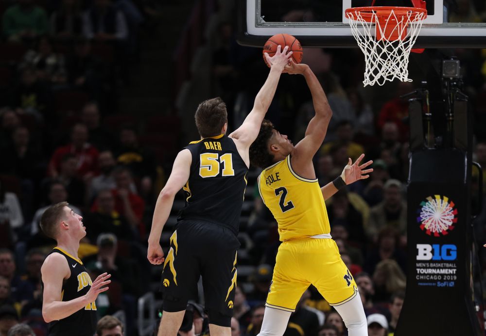 Iowa Hawkeyes forward Nicholas Baer (51) against the Michigan Wolverines in the 2019 Big Ten Men's Basketball Tournament Friday, March 15, 2019 at the United Center in Chicago. (Brian Ray/hawkeyesports.com)