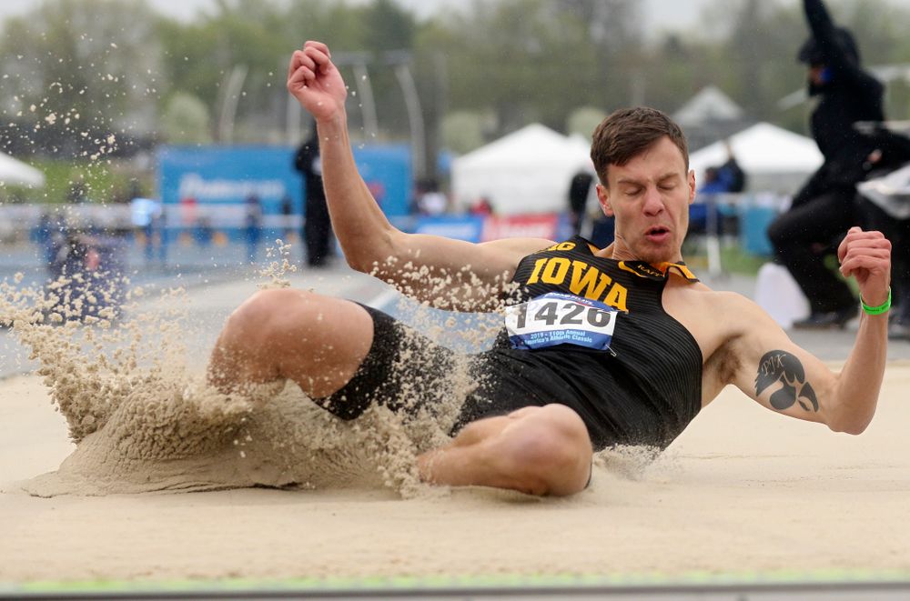 Iowa's Cooper Koenig jumps in the men's long jump event during the third day of the Drake Relays at Drake Stadium in Des Moines on Saturday, Apr. 27, 2019. (Stephen Mally/hawkeyesports.com)