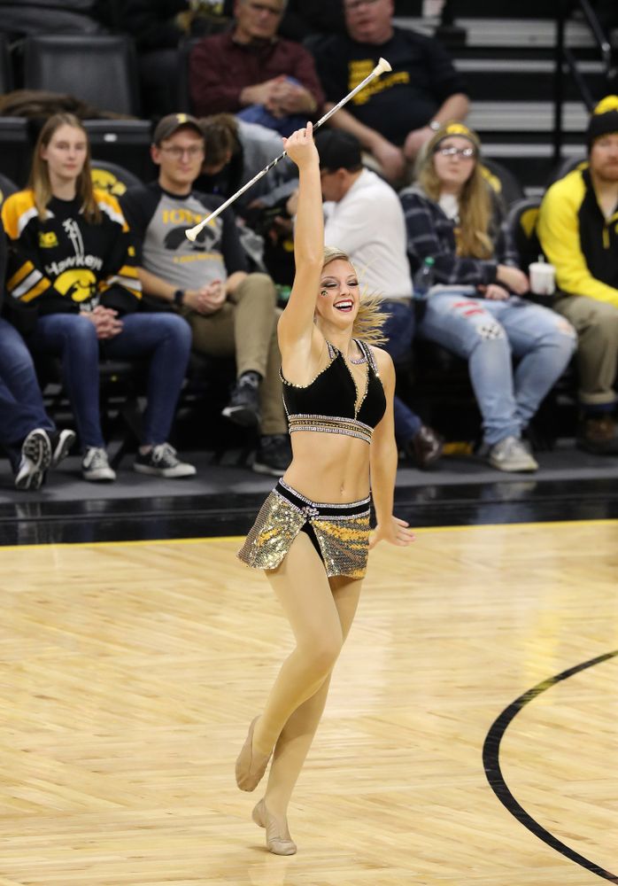 Hawkeye Marching Band Golden Girl Kylene Spanbauer against the Michigan Wolverines Thursday, January 17, 2019 at Carver-Hawkeye Arena. (Brian Ray/hawkeyesports.com)