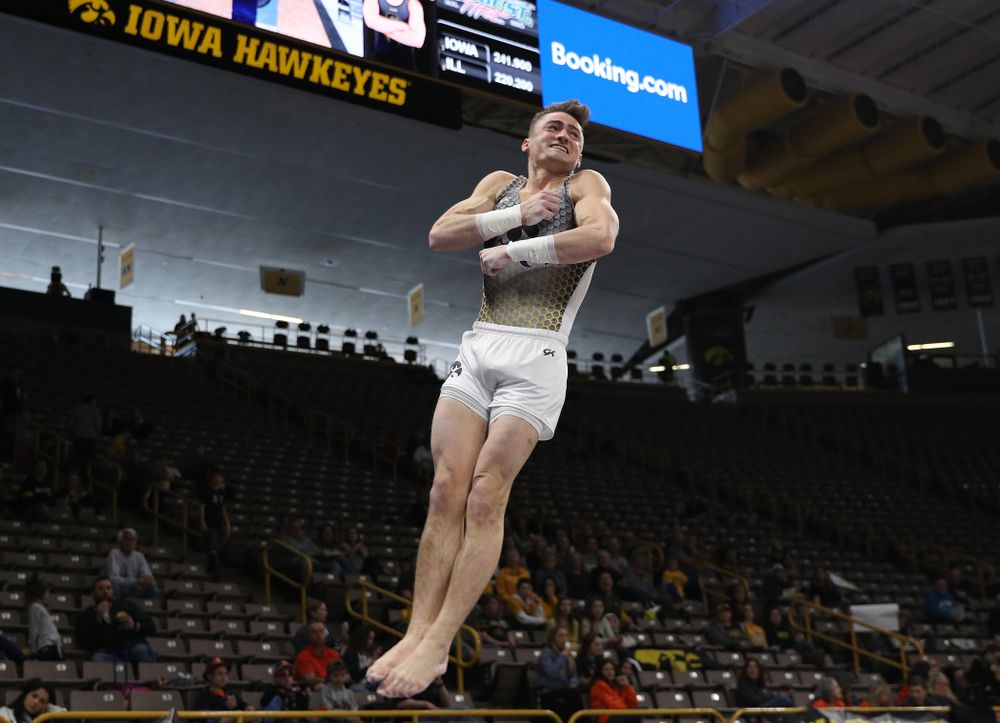 Iowa’s Mitch Mandozzi competes on the vault against Illinois Sunday, March 1, 2020 at Carver-Hawkeye Arena. (Brian Ray/hawkeyesports.com)