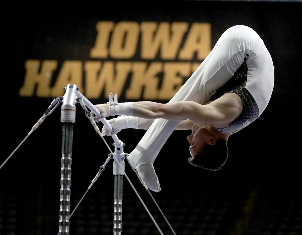 Iowa’s Mitch Mandozzi competes on the high bar against Illinois Sunday, March 1, 2020 at Carver-Hawkeye Arena. (Brian Ray/hawkeyesports.com)