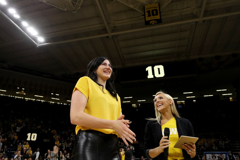 Megan Gustafson smiles after her number was raised into the rafters during a jersey retirement ceremony Sunday, January 26, 2020 at Carver-Hawkeye Arena. (Brian Ray/hawkeyesports.com)
