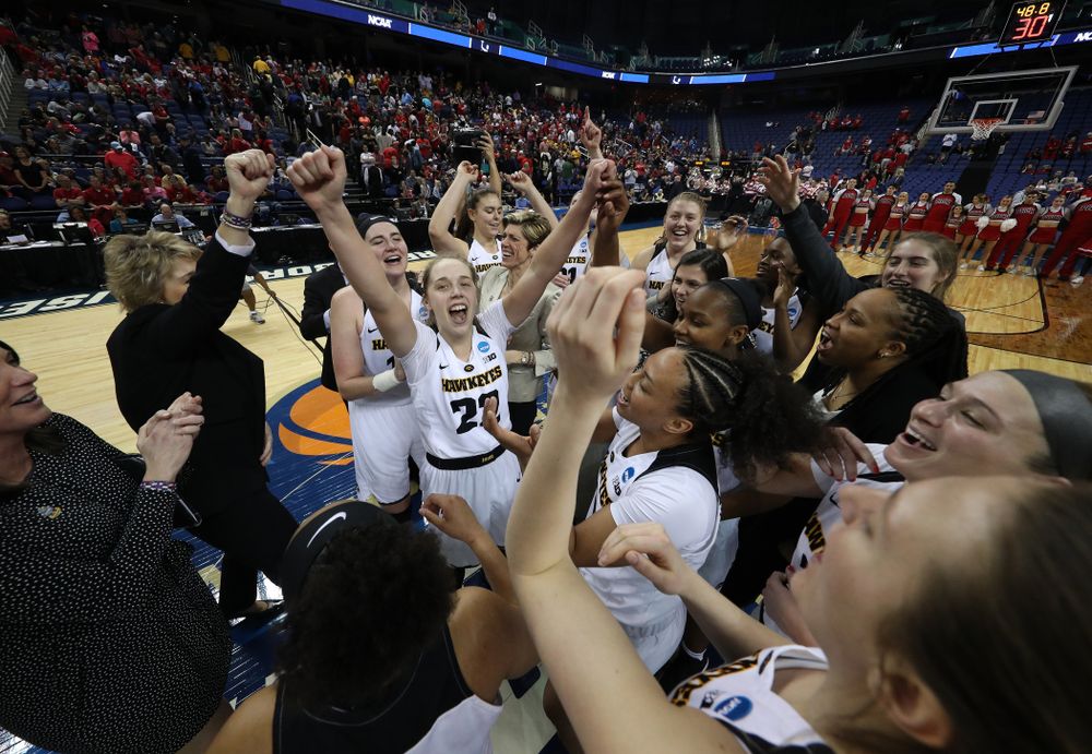 The Iowa Hawkeyes celebrate their victory over the NC State Wolfpack in the regional semi-final of the 2019 NCAA Women's College Basketball Tournament Saturday, March 30, 2019 at Greensboro Coliseum in Greensboro, NC.(Brian Ray/hawkeyesports.com)