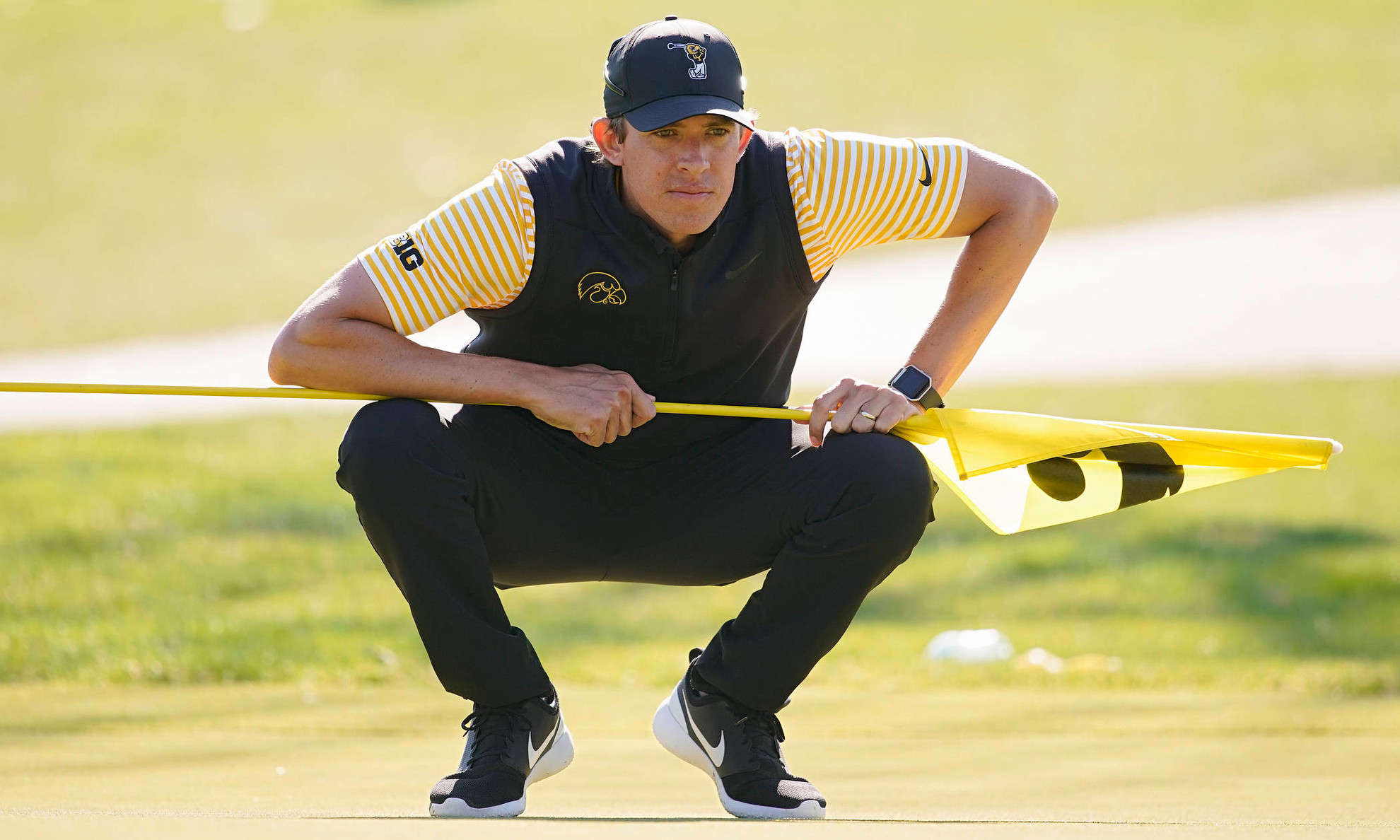 37913489-04212019_iowa_mens_golf_hawkeye_invitational_11.JPG Iowa assistant coach Charlie Hoyle reads the green during the third round of the Hawkeye Invitational at Finkbine Golf Course in Iowa City on Sunday, Apr. 21, 2019. (Stephen Mally/hawkeyesports.com)