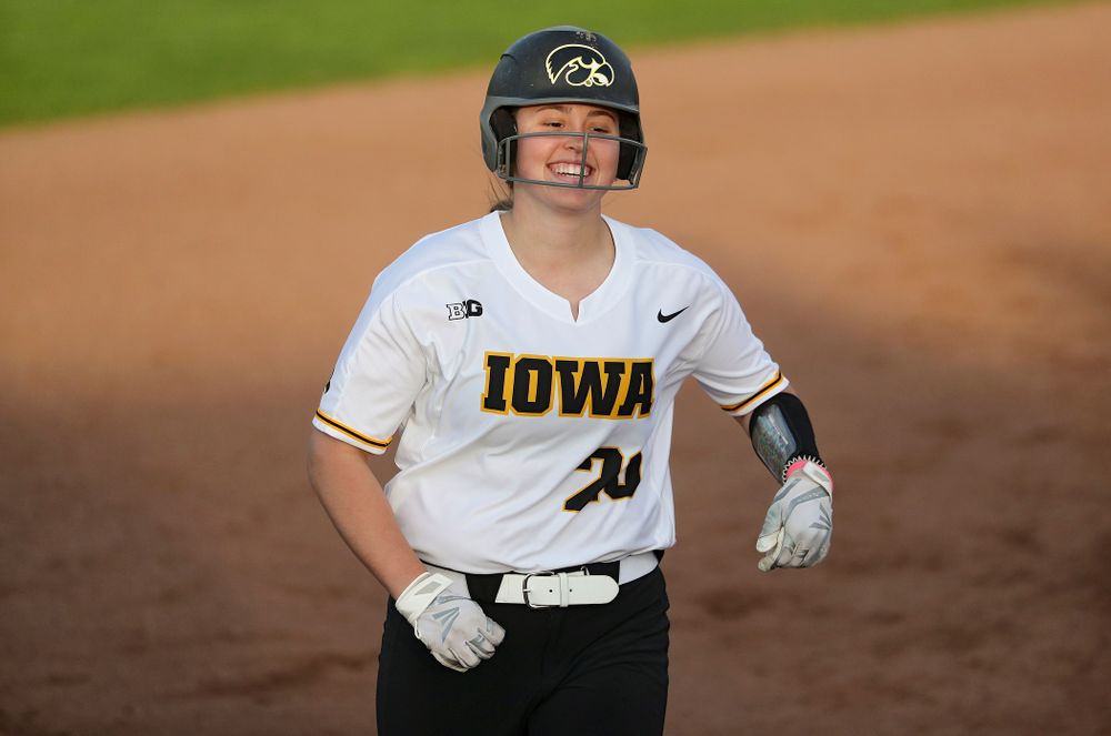 Iowa designated player Miranda Schulte (20) rounds the bases with a big smile after hitting a home run during the sixth inning of their game against Ohio State at Pearl Field in Iowa City on Friday, May. 3, 2019. (Stephen Mally/hawkeyesports.com)