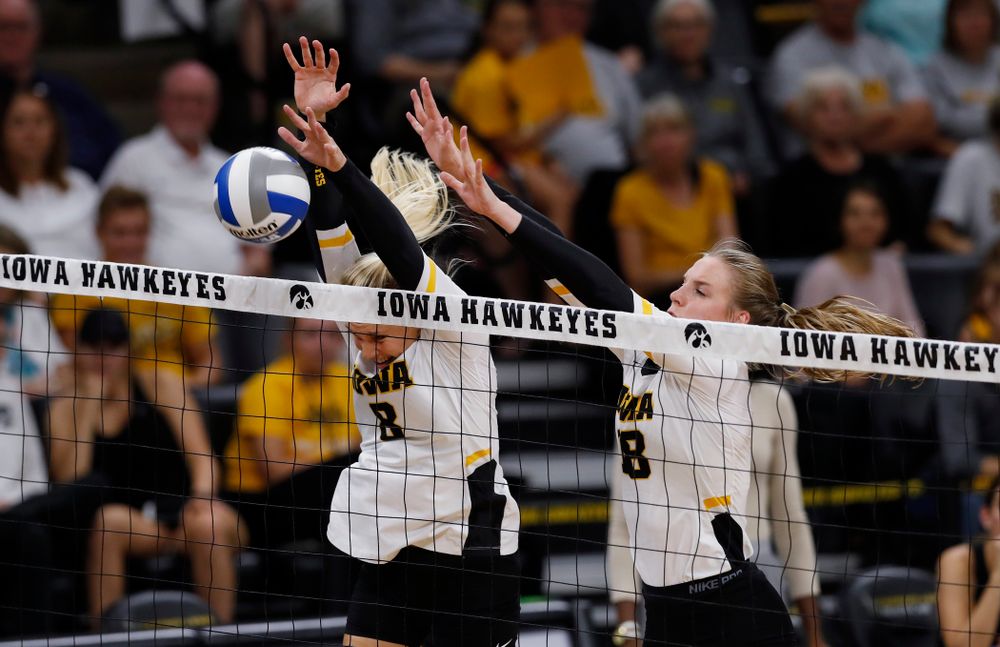 Iowa Hawkeyes right side hitter Reghan Coyle (8) and middle blocker Hannah Clayton (18) against Eastern Illinois Sunday, September 9, 2018 at Carver-Hawkeye Arena. (Brian Ray/hawkeyesports.com)
