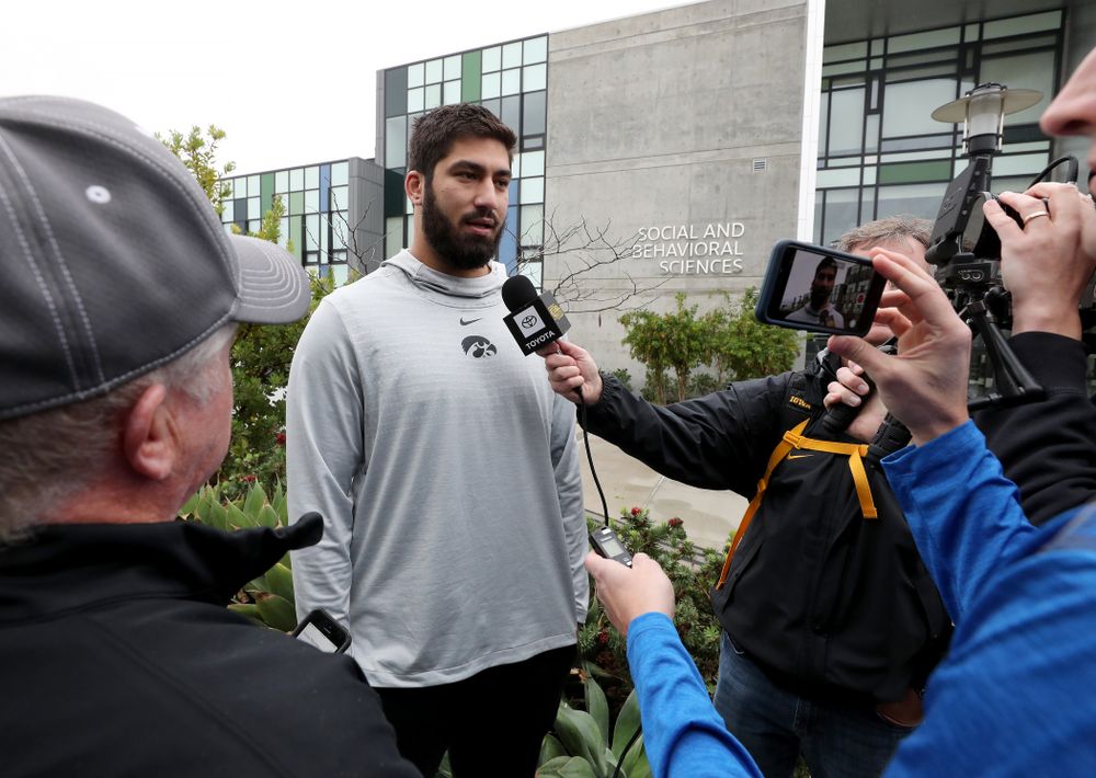 Iowa Hawkeyes defensive end A.J. Epenesa (94) answers questions from the media following practice Monday, December 23, 2019 at Mesa College in San Diego. (Brian Ray/hawkeyesports.com)