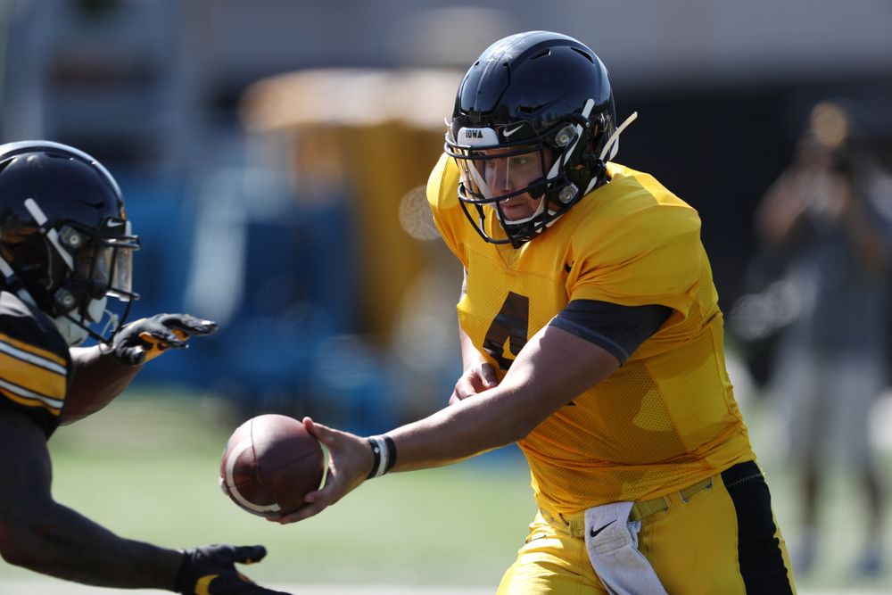 Iowa Hawkeyes quarterback Nate Stanley (4) during Fall Camp Practice No. 5 Tuesday, August 6, 2019 at the Ronald D. and Margaret L. Kenyon Football Practice Facility. (Brian Ray/hawkeyesports.com)