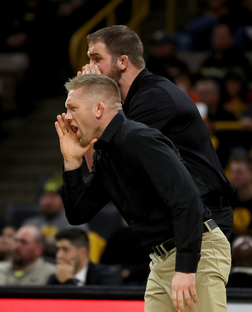 Iowa assistant coach Ryan Morningstar as Tony Cassioppi wrestles WisconsinÕs Trent Hillger at heavyweight Sunday, December 1, 2019 at Carver-Hawkeye Arena. Cassioppi won the match 3-2. (Brian Ray/hawkeyesports.com)