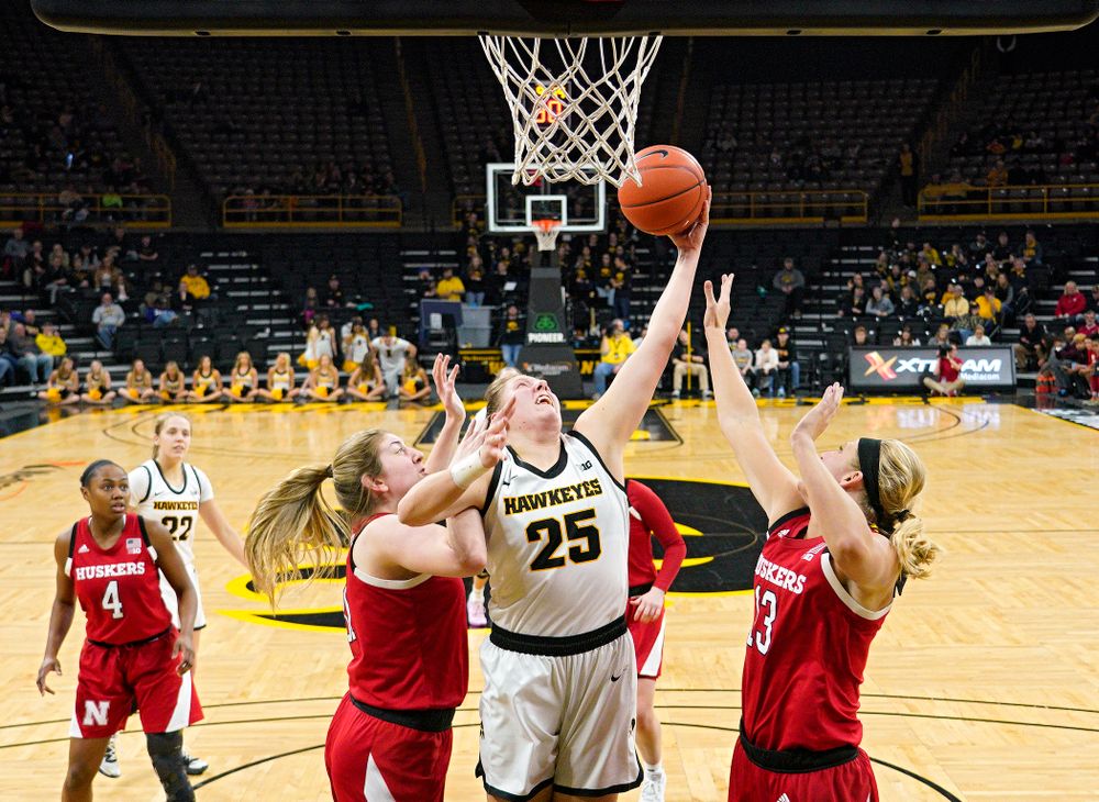 Iowa Hawkeyes forward Monika Czinano (25) pulls in a rebound during the third quarter of the game at Carver-Hawkeye Arena in Iowa City on Thursday, February 6, 2020. (Stephen Mally/hawkeyesports.com)