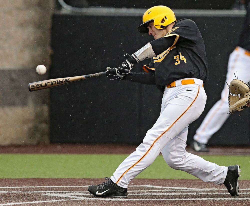 Iowa Hawkeyes catcher Austin Martin (34) drives in a run with a hit during the seventh inning of their game against Illinois State at Duane Banks Field in Iowa City on Wednesday, Apr. 3, 2019. (Stephen Mally/hawkeyesports.com)