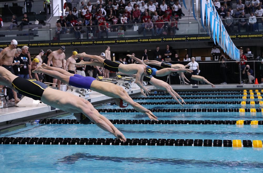 Iowa's Jack Smith and Aleksey Tarasenko swim in the preliminaries of the 50-yard freestyle during the 2019 Big Ten Swimming and Diving Championships Thursday, February 28, 2019 at the Campus Wellness and Recreation Center. (Brian Ray/hawkeyesports.com)