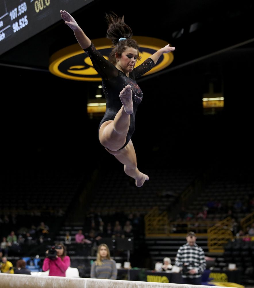 Iowa’s Erin Castle competes on the beam against Michigan Friday, February 14, 2020 at Carver-Hawkeye Arena. (Brian Ray/hawkeyesports.com)