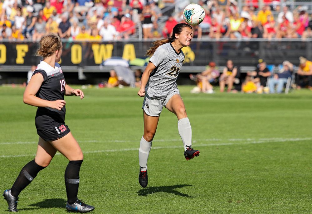 Iowa forward Emma Tokuyama (21) wins a header during the second half of their match at the Iowa Soccer Complex in Iowa City on Sunday, Sep 1, 2019. (Stephen Mally/hawkeyesports.com)