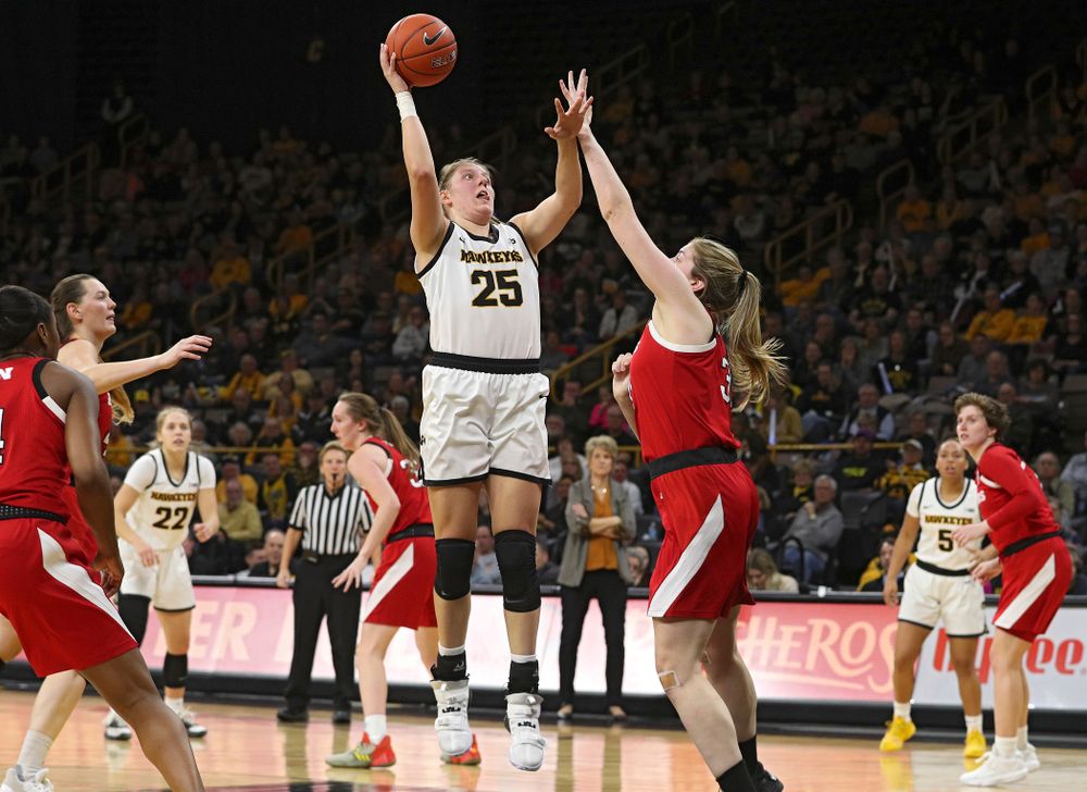 Iowa Hawkeyes forward Monika Czinano (25) makes a basket during the third quarter of the game at Carver-Hawkeye Arena in Iowa City on Thursday, February 6, 2020. (Stephen Mally/hawkeyesports.com)