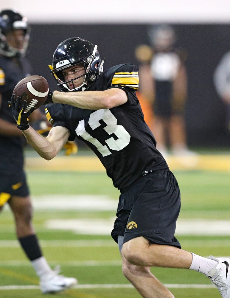 Iowa Hawkeyes wide receiver Henry Marchese (13) pulls in a pass during Fall Camp Practice No. 9 at the Hansen Football Performance Center in Iowa City on Monday, Aug 12, 2019. (Stephen Mally/hawkeyesports.com)