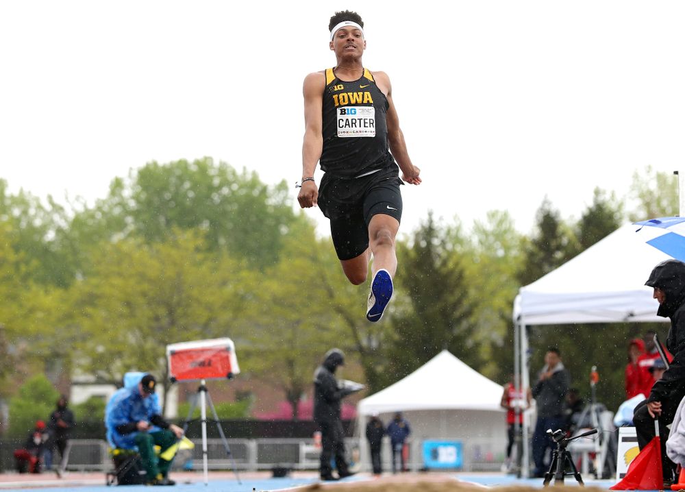 Iowa's James Carter jumps in the men’s long jump event on the second day of the Big Ten Outdoor Track and Field Championships at Francis X. Cretzmeyer Track in Iowa City on Saturday, May. 11, 2019. (Stephen Mally/hawkeyesports.com)