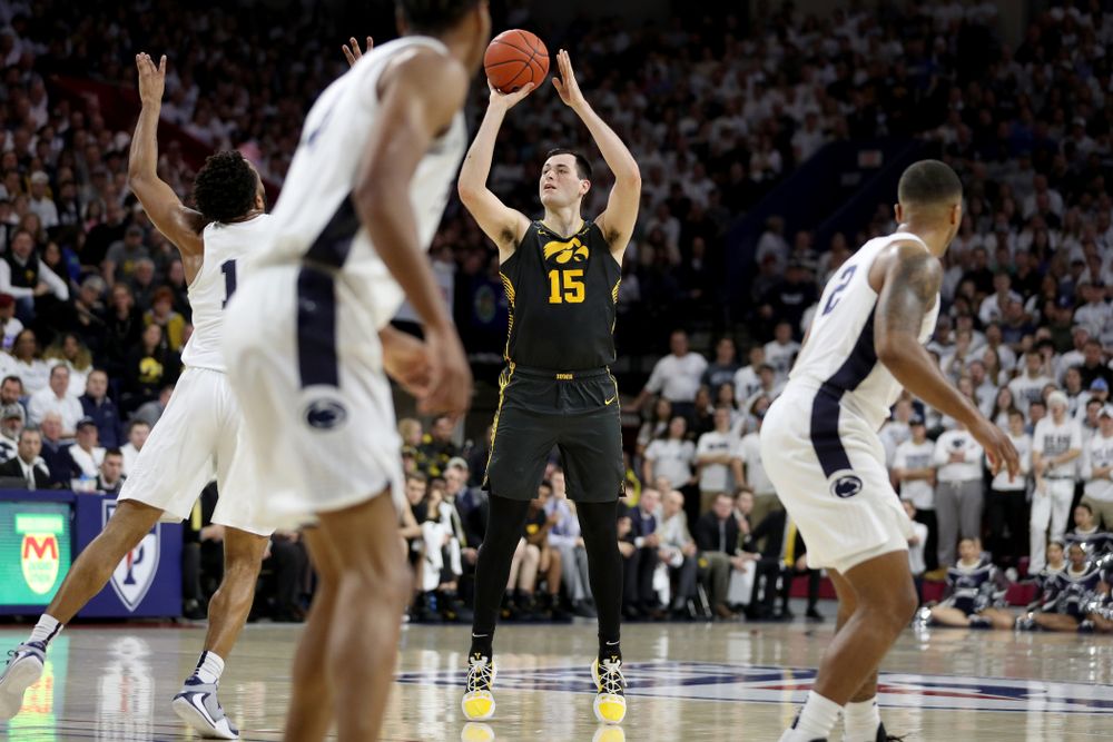 Iowa Hawkeyes forward Ryan Kriener (15) pulls up for a shot against Penn State Friday, January 3, 2020 at the Palestra in Philadelphia. (Brian Ray/hawkeyesports.com)