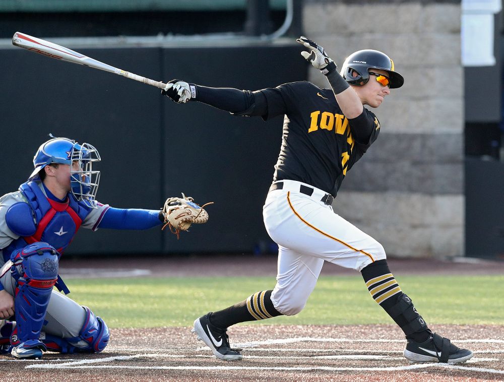 Iowa catcher Tyler Snep (16) drives a pitch for a hit during the fourth inning of their college baseball game at Duane Banks Field in Iowa City on Tuesday, March 10, 2020. (Stephen Mally/hawkeyesports.com)