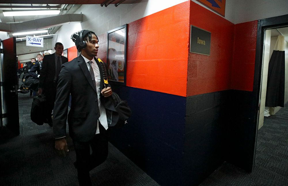 Iowa Hawkeyes guard Bakari Evelyn (4) walks to the locker room as the team arrives before their ACC/Big Ten Challenge game at the Carrier Dome in Syracuse, N.Y. on Tuesday, Dec 3, 2019. (Stephen Mally/hawkeyesports.com)