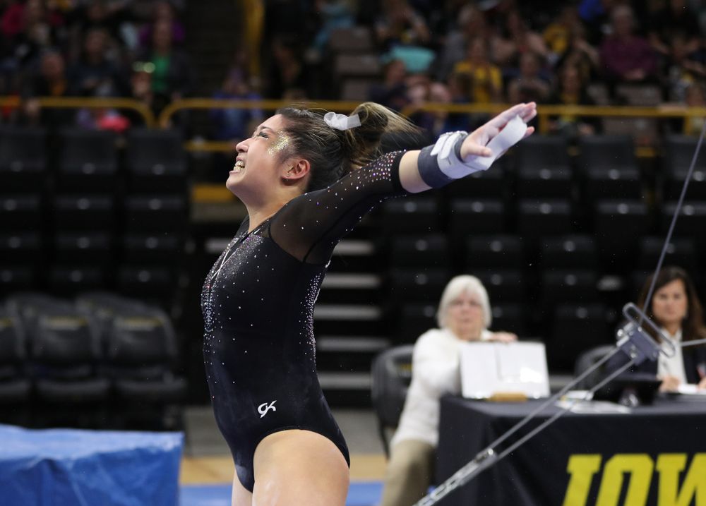 Iowa's Nicole Chow competes on the bars against Illinois Saturday, February 16, 2019 at Carver-Hawkeye Arena. (Brian Ray/hawkeyesports.com)