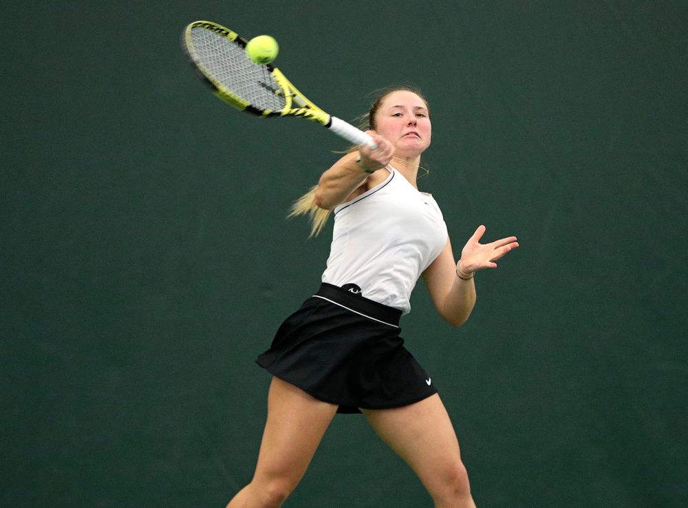 Iowa’s Danielle Burich returns a shot during her doubles match at the Hawkeye Tennis and Recreation Complex in Iowa City on Sunday, February 16, 2020. (Stephen Mally/hawkeyesports.com)
