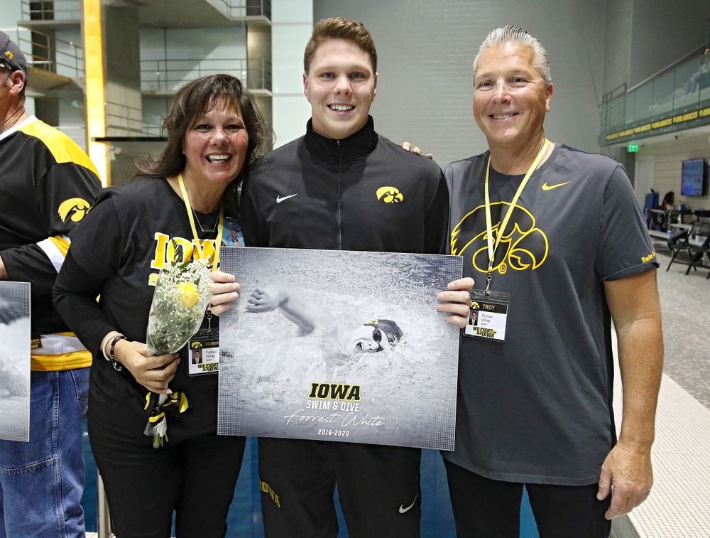 Iowa’s Forrest White is honored on senior day before their meet at the Campus Recreation and Wellness Center in Iowa City on Friday, February 7, 2020. (Stephen Mally/hawkeyesports.com)