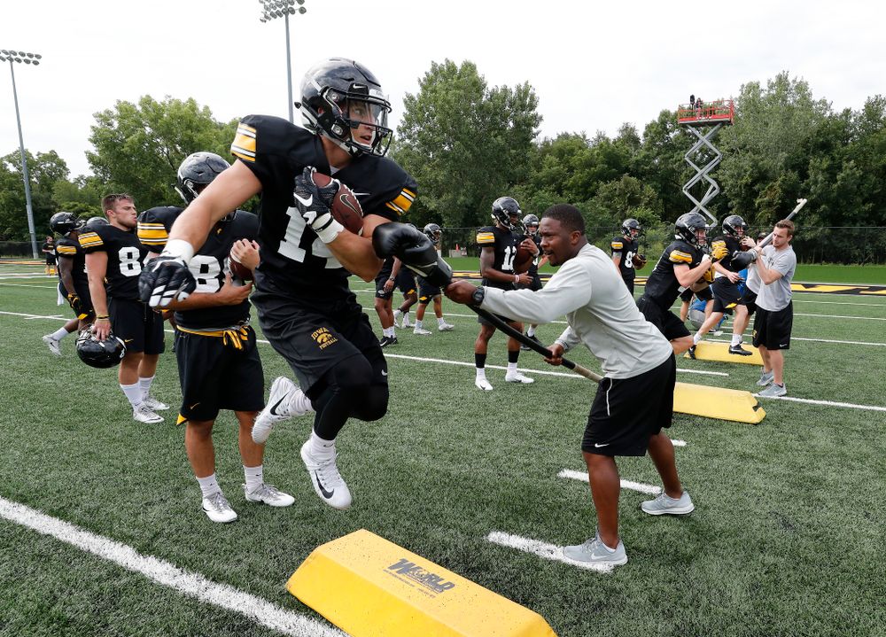 Iowa Hawkeyes wide receiver Kyle Groeneweg (14) and running backs coach Derrick Foster during practice No. 4 of Fall Camp Monday, August 6, 2018 at the Hansen Football Performance Center. (Brian Ray/hawkeyesports.com)