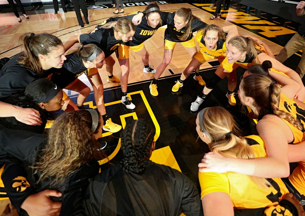The Hawkeyes huddle before their game against Winona State at Carver-Hawkeye Arena in Iowa City on Sunday, Nov 3, 2019. (Stephen Mally/hawkeyesports.com)