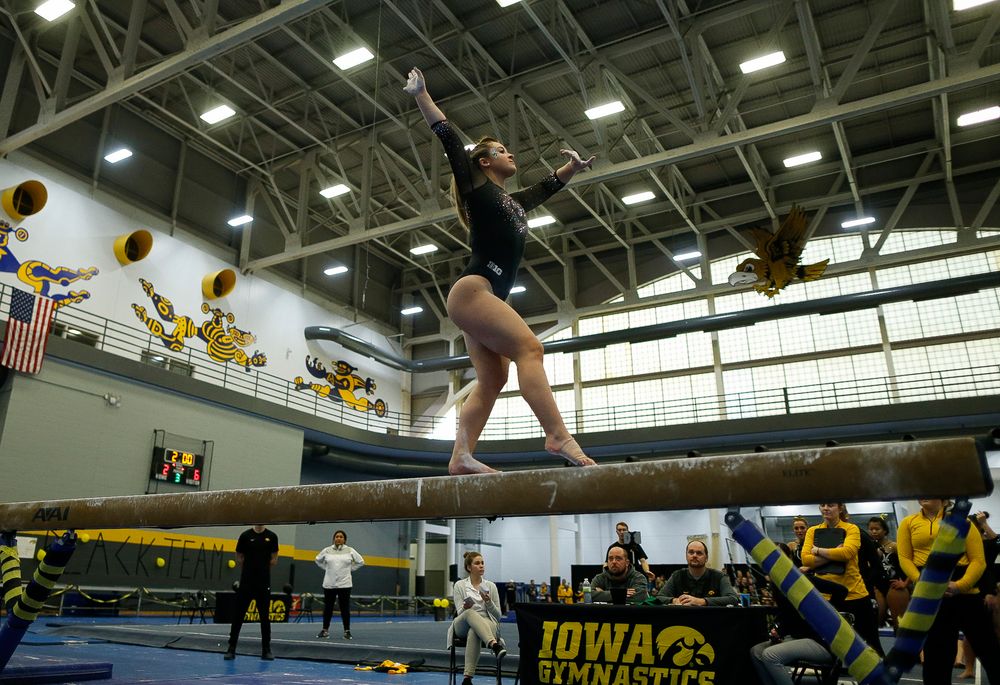 Madison Kampschroeder competes on the balance beam during the Black and Gold Intrasquad meet at the Field House on 12/2/17. (Tork Mason/hawkeyesports.com)